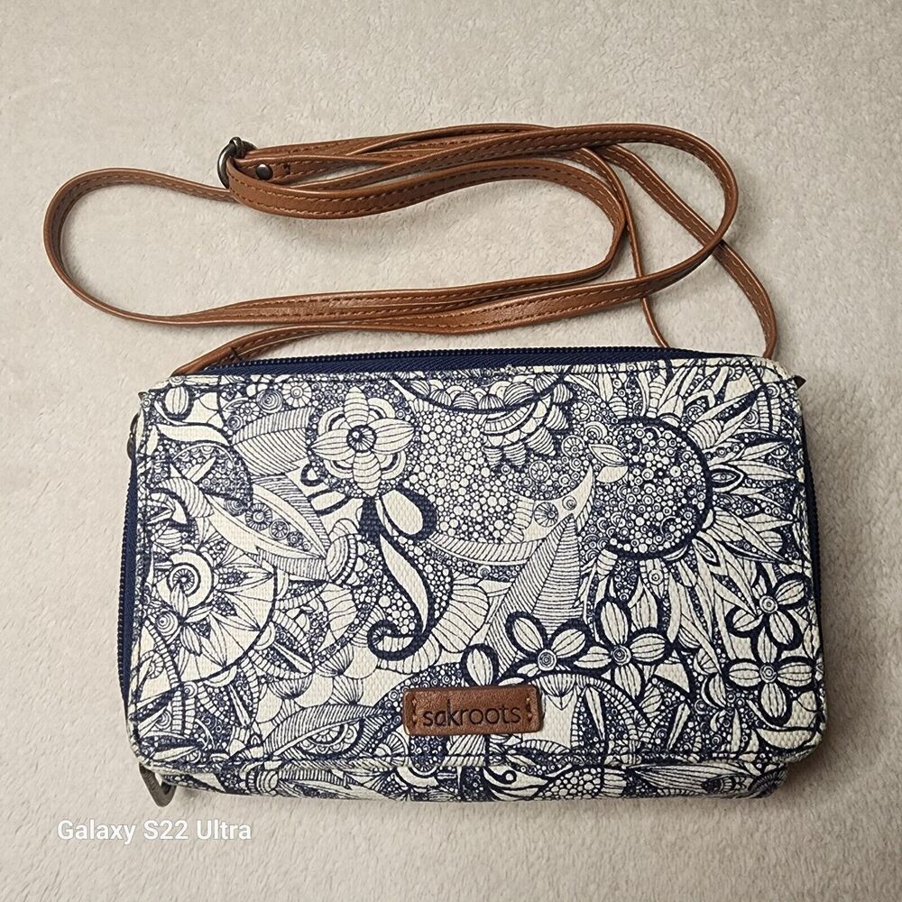 SAKROOTS Crossbody/Wallet-Smart Phone-16 CC Slots-4 Full Dollar/+Phone